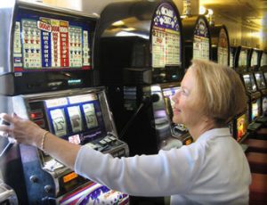 Online Gambling Woman playing Slot Machines